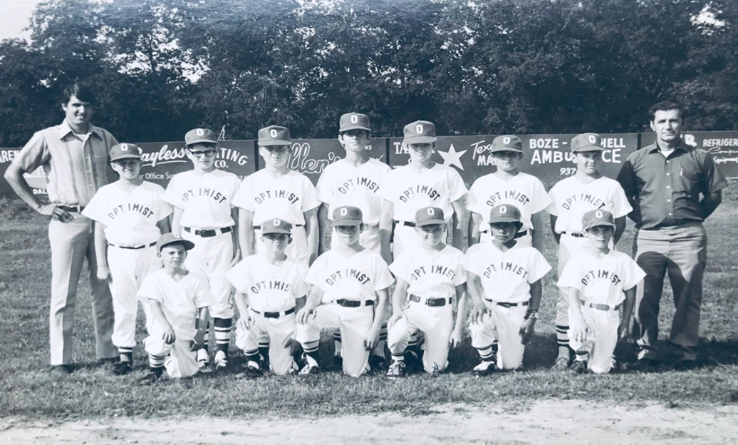 Where it started — the Optimist club team, and the coaches who set the standard.