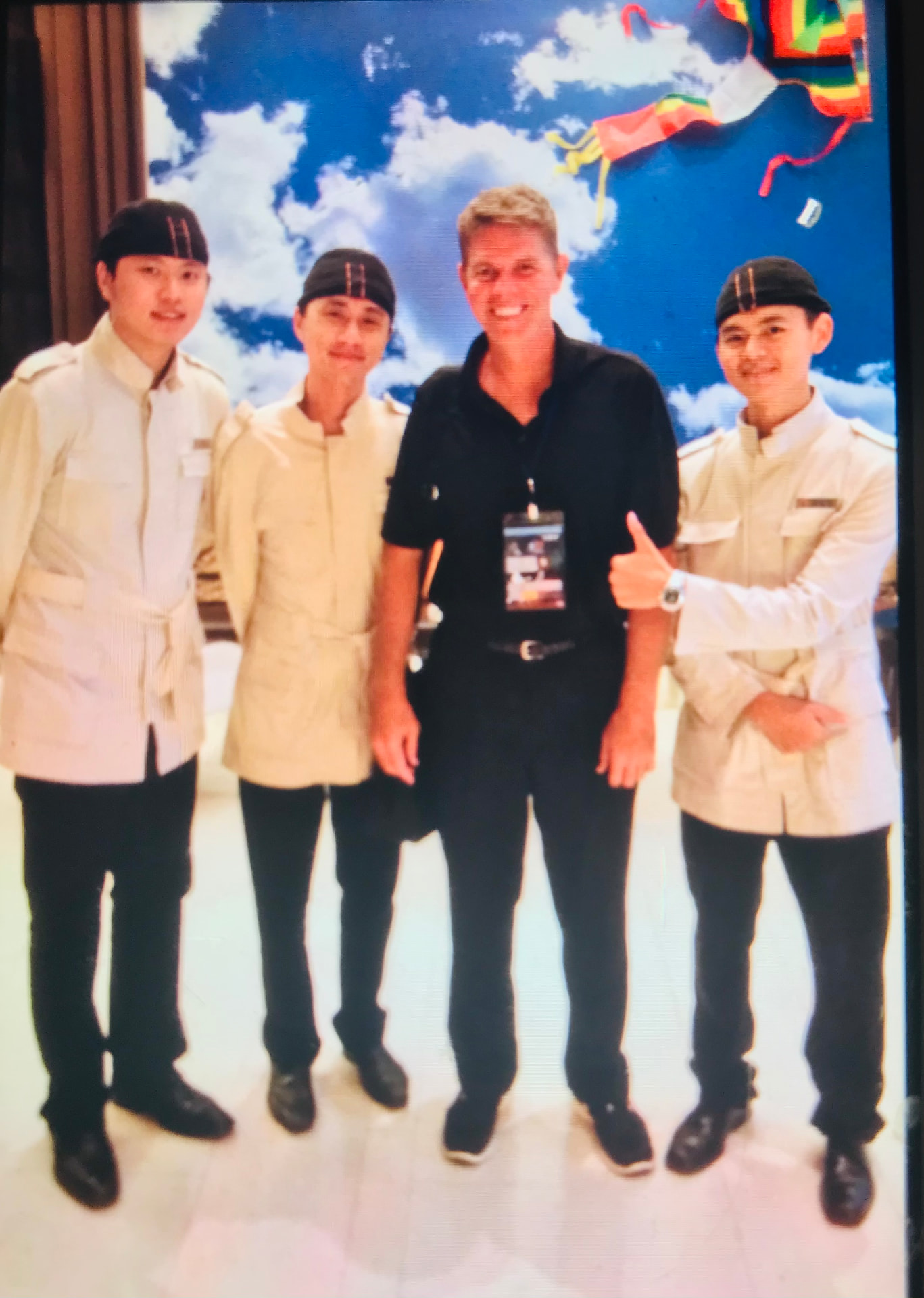 Joel D. Bradley with hotel staff while scouting in Taiwan