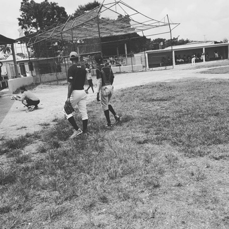 A Caribbean academy field — the daily rhythm of international development.