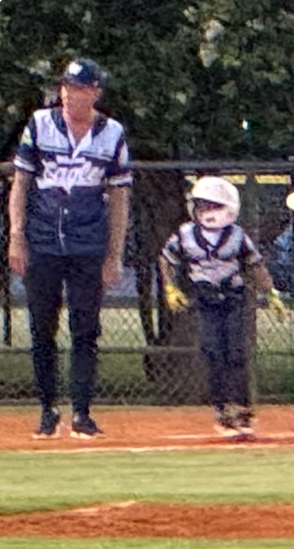 Joel D. Bradley teaching the fundamentals to a young player